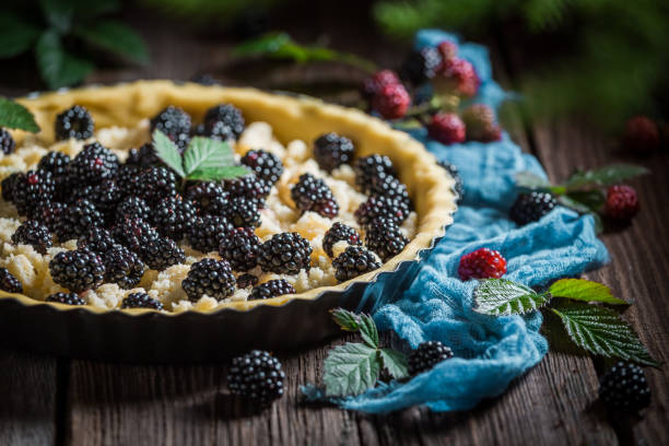 istock Sweet and homemade blackberry pie with caster cugar 875561912