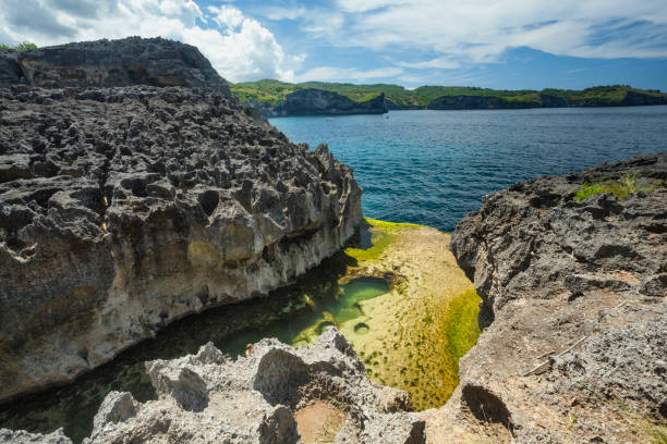 istock Angel's Billabong cliffs. Nusa Penida island, Indonesia 875567756