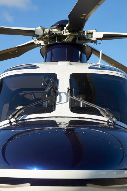 istock Exterior Front View Of Helicopter Cockpit And Rotor Blades 875569160