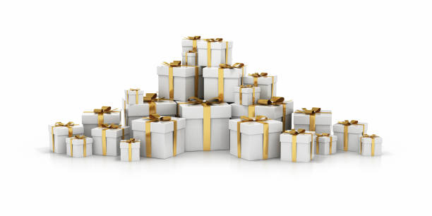 istock White Boxes Tied with Gold Colored Ribbon - Isolated on White Background 875569872