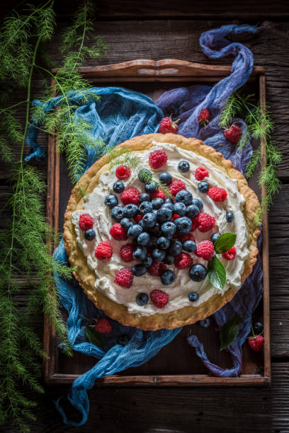 istock Sweet tart with fresh blueberries and raspberries 875570028
