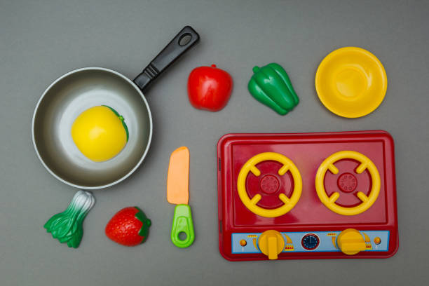 istock Plastic children's toy colored vegetables and utensils. 875579062