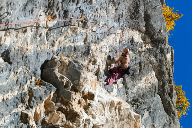 istock Extreme autumn,rock climbing 875592718
