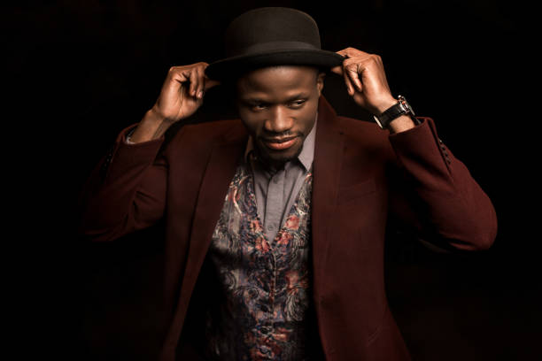 istock fashionable man in hat 875599326