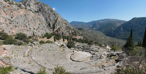 istock Panoramic view of Ancient theater in Delphi, Greece in a summer day 875605870
