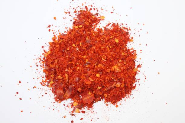 istock Heap of cayenne pepper 875607348
