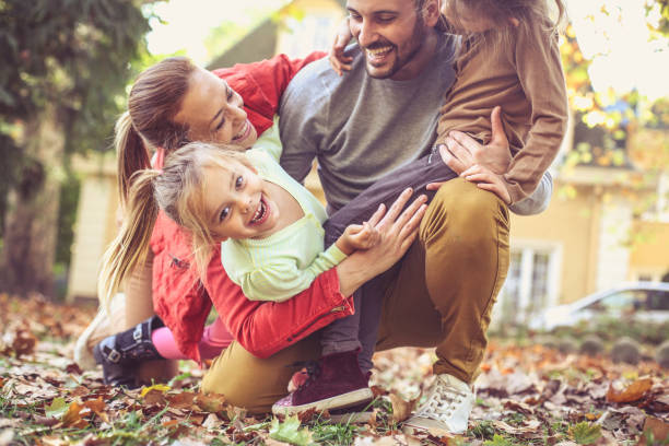 istock Smiling happy family playing together. 875614376