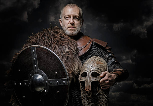 istock Handsome bloody viking male warrior in emotional pose 875617030