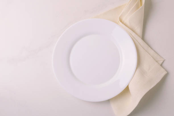 istock Food background. White empty plate, napkin. Top view, copyspace. 875618762