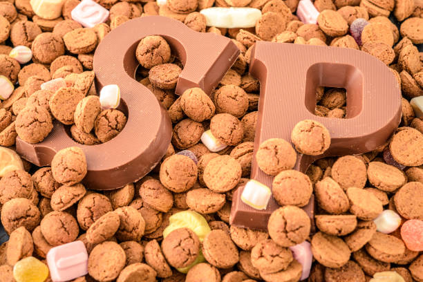 istock Sinterklaas or Sint Nicolaas Dutch folklore children's holiday pepernoten candy 875629010