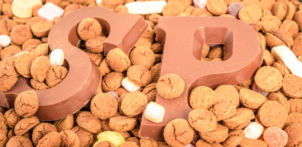 istock Sinterklaas or Sint Nicolaas Dutch folklore children's holiday pepernoten candy 875629400
