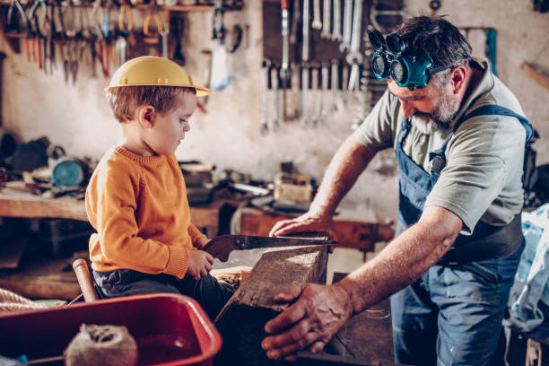 istock Grand parent and grand son in garage 875632414