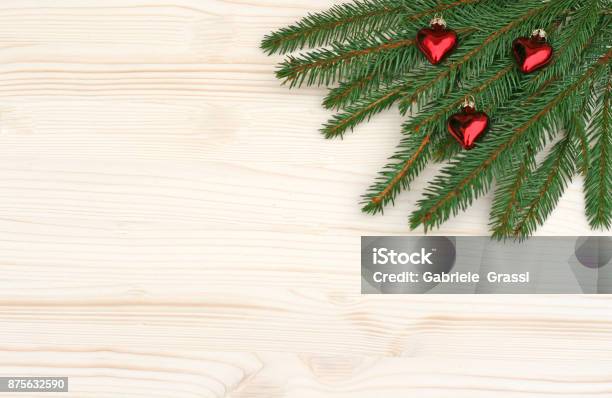 Christmas Spruce Branches And Red Hearts Stock Photo - Download Image Now - Advent, Backgrounds, Branch - Plant Part
