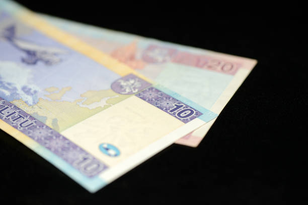 istock Banknotes of ten and twenty Lithuanian litas on a dark background 875635802