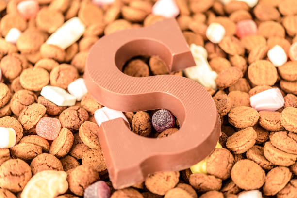 istock Sinterklaas or Sint Nicolaas Dutch folklore children's holiday pepernoten candy 875636852