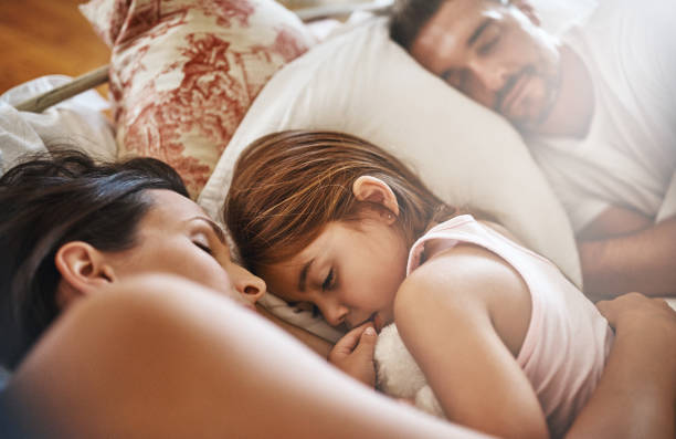 istock She won't be leaving their bed soon 875639624