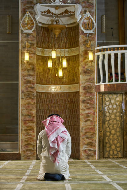 istock muslim man praying inside the mosque 875639794