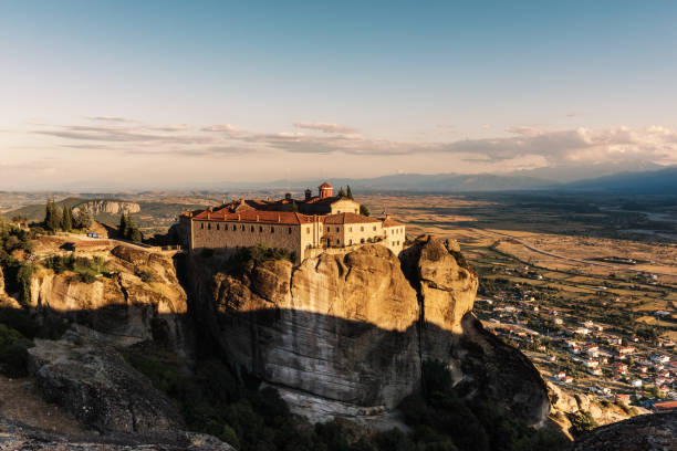 istock Monastery on the high rock in Meteora, Thessaly valley, Greece 875643894