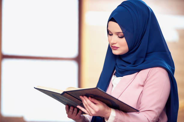 istock muslim woman praying in mosque 875644202