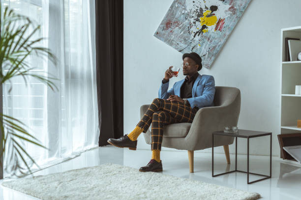 istock fashionable african american man with whiskey 875644854