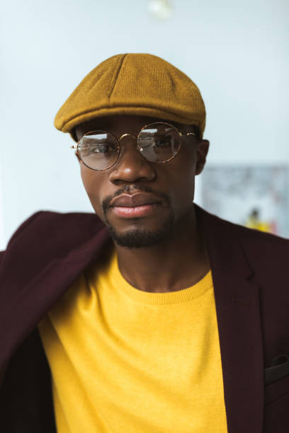 istock man in cap and eyeglasses 875646886