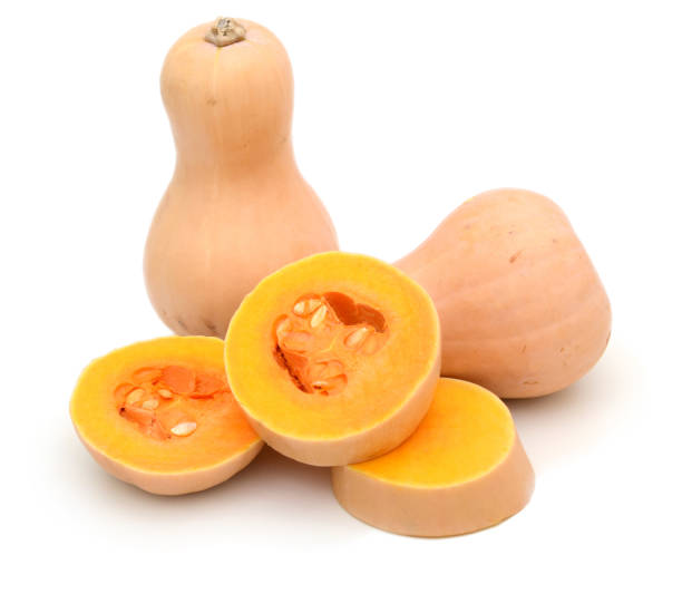 istock Butternut squash pumpkin composition whole and half isolated on white background 875654772