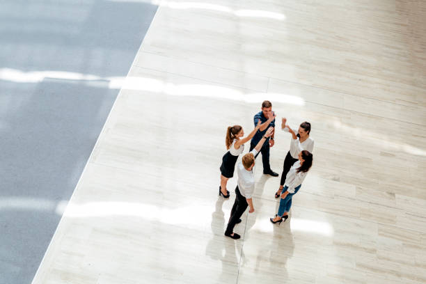 istock Business teamwork. People with joined hands. Union 875657888