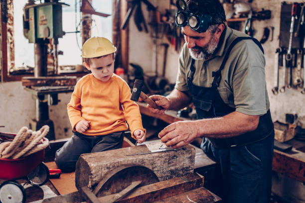 istock Grand parent and grand son in garage 875661062