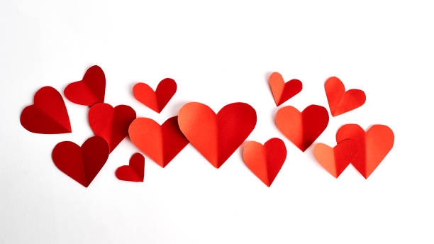 istock Red paper hearts isolated on white 875666048
