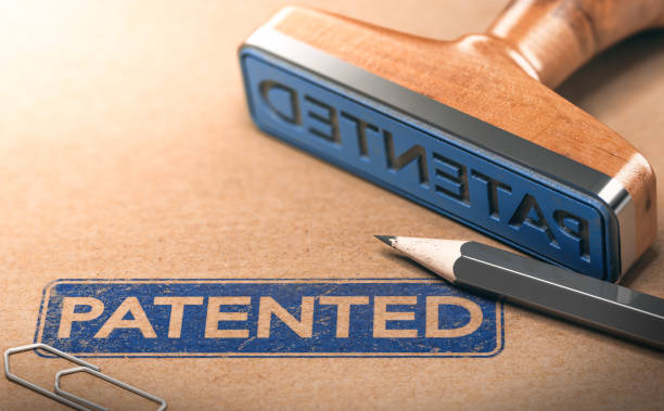 IP, Intellectual Property Patent Concept 3D illustration of rubber stamp with the text patented. IP law and intellectual property patent concept trademark stock pictures, royalty-free photos & images