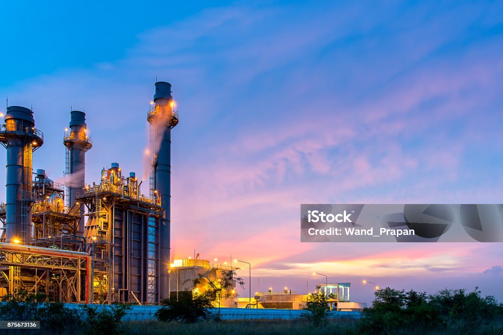 Oil refinery, petroleum and energy plant at twilight with sky background.  Industry Concept Petrochemical Plant Stock Photo