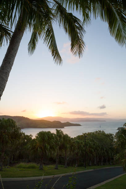istock Romantic sunset over an island at sunset 875677106