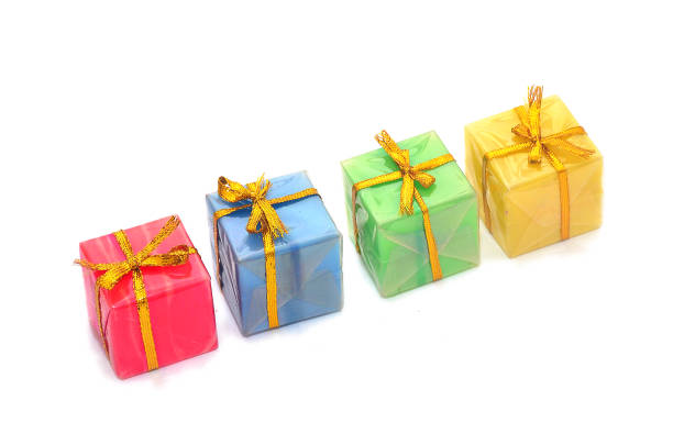 istock Christmas gifts. Multicolored and beribboned gift boxes in pile 875680444