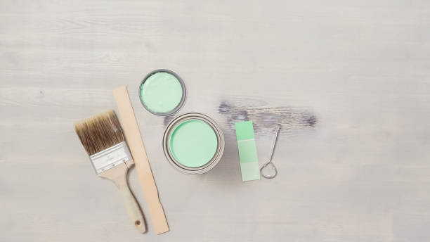 istock Painting wood with turquose color paint. 875681502