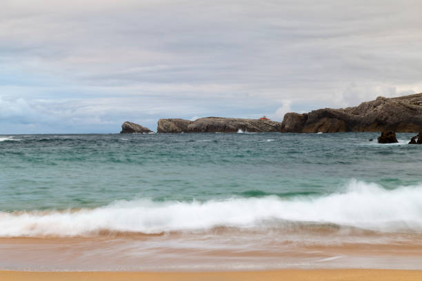 istock beach with waves and without people 875681520