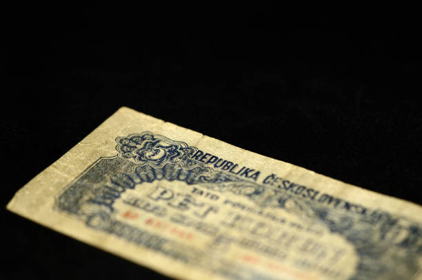 An obsolete banknote in five Czechoslovak krones on a dark background
