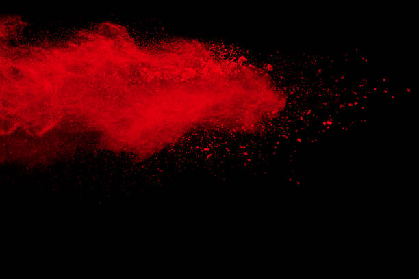 赤い粉塗装爆発の奇妙な形 - fire power ストックフォトと画像