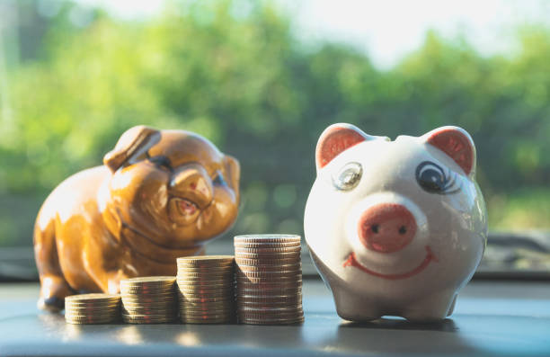 istock Stack coins with piggy bank. Financial, accounting and saving concept. 875685364