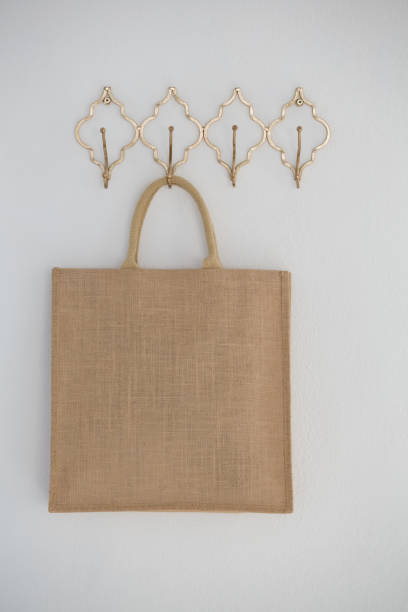 istock Close-up of bag hanging on hook 875685536