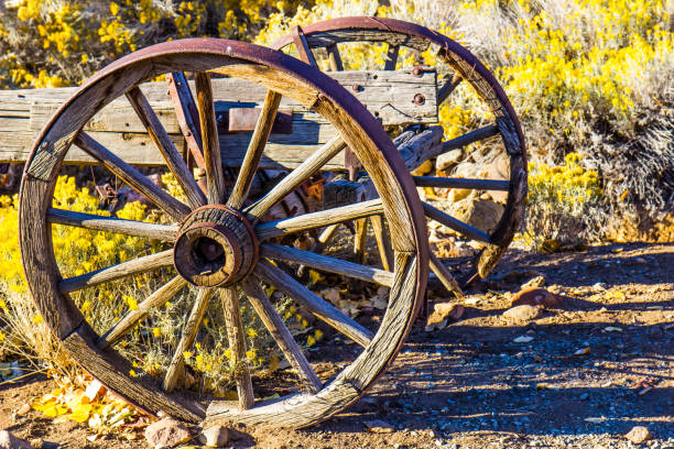 Two Vintage Wooden Wagon Wheels With Iron Rims