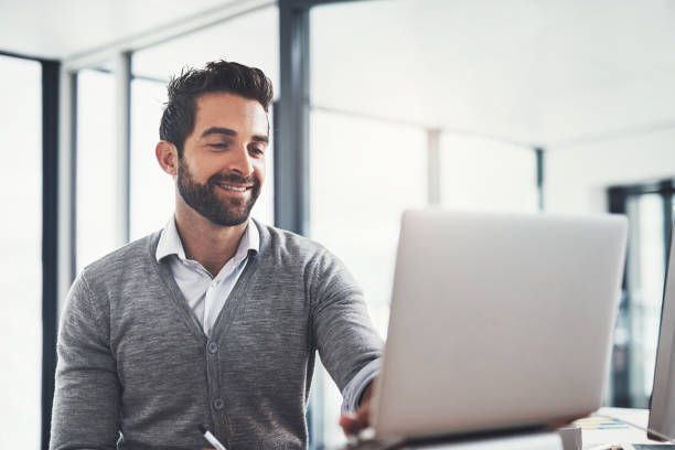 istock Working hard to maintain his lead in the business game 875693198