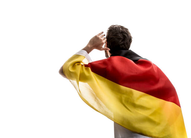 istock German male athlete / fan celebrating on white background 875693946
