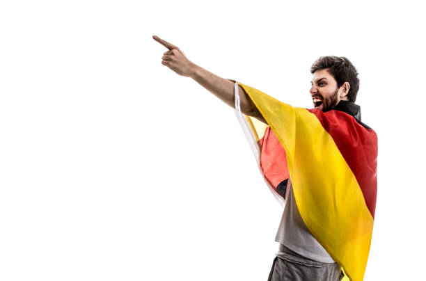 istock German male athlete / fan celebrating on white background 875693952