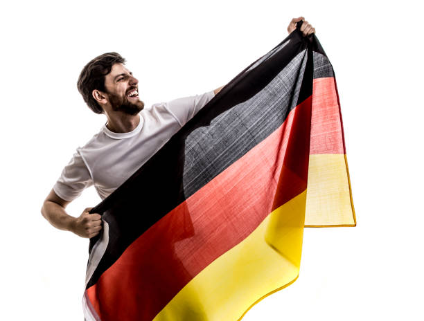 istock German male athlete / fan celebrating on white background 875693954