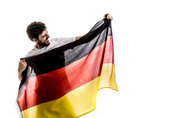 istock German male athlete / fan celebrating on white background 875693958