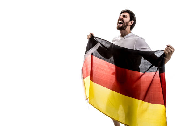 istock German male athlete / fan celebrating on white background 875693960