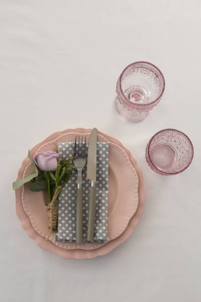 istock Beautiful table setting with floral arrangement 875700194