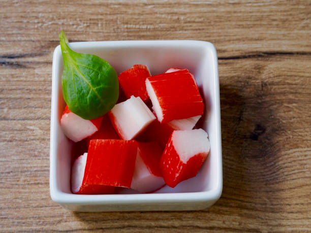 istock Surimi in a recipe on wood background 875706948