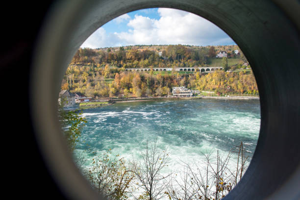 istock Rheinfall in Autumn, the biggest waterfall in Europe 875721454
