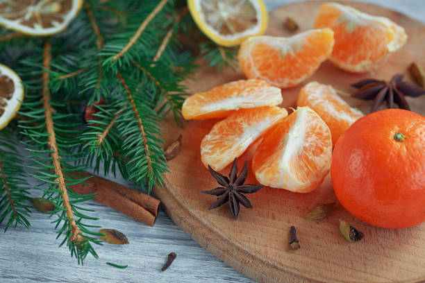 istock Mandarins (tangerines), spices and fir tree branches. 875721874